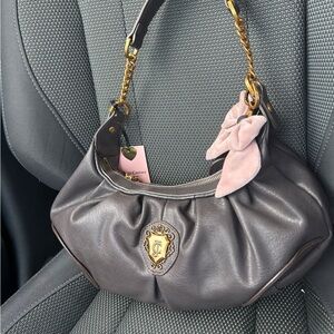 Juicy Couture chocolate brown viral dumpling bag with charms
